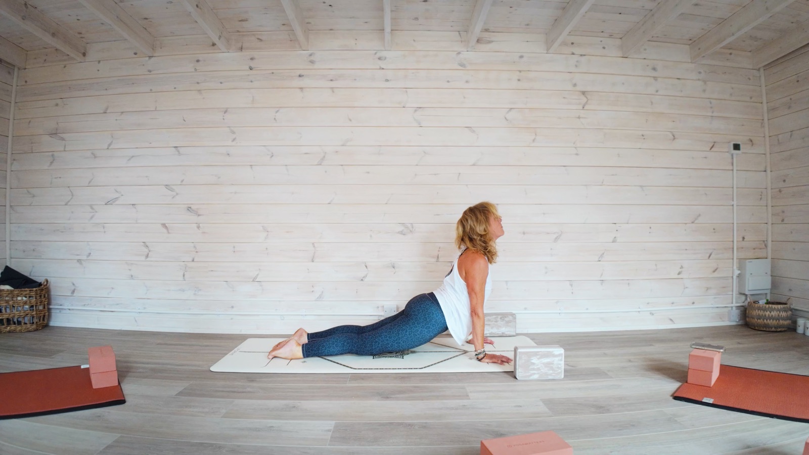 The instructor in upward dog